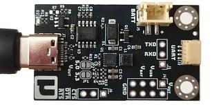 USB-C charger with UART converter